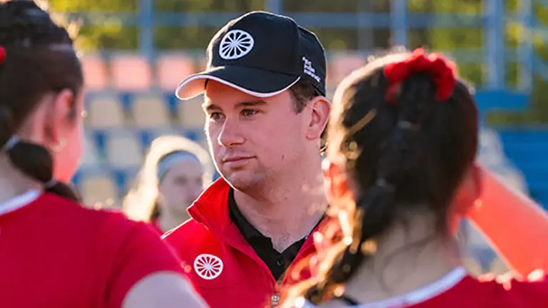 An action shot of Mike Van Iderstine coaching