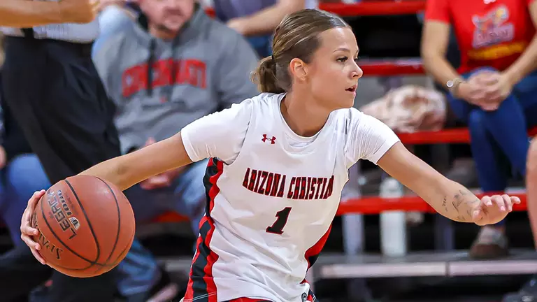 Taylor Schwab dribbles for ACU.