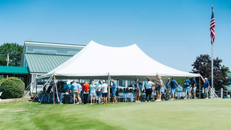 An image of the lunch tent at the 10th annual Alfond Golf Classic.