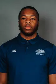 2026 Maine football roster head shot. Blue polo with Maine script.
