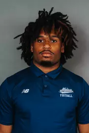 2026 Maine football roster head shot. Blue polo with Maine script.