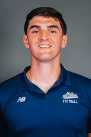 2026 Maine football roster head shot. Blue polo with Maine script.
