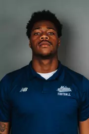 2026 Maine football roster head shot. Blue polo with Maine script.