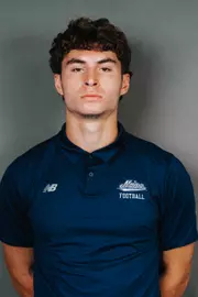 2026 Maine football roster head shot. Blue polo with Maine script.