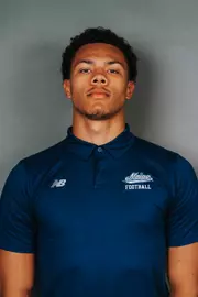 2026 Maine football roster head shot. Blue polo with Maine script.