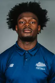 2026 Maine football roster head shot. Blue polo with Maine script.
