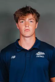 2026 Maine football roster head shot. Blue polo with Maine script.