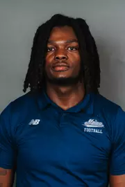 2026 Maine football roster head shot. Blue polo with Maine script.