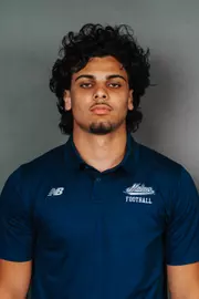 2026 Maine football roster head shot. Blue polo with Maine script.