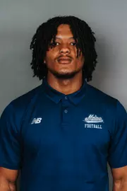 2026 Maine football roster head shot. Blue polo with Maine script.