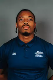 2026 Maine football roster head shot. Blue polo with Maine script.