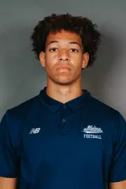 2026 Maine football roster head shot. Blue polo with Maine script.