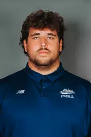 2026 Maine football roster head shot. Blue polo with Maine script.