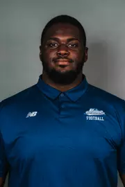 2026 Maine football roster head shot. Blue polo with Maine script.