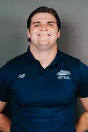 2026 Maine football roster head shot. Blue polo with Maine script.