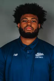 2026 Maine football roster head shot. Blue polo with Maine script.