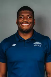 2026 Maine football roster head shot. Blue polo with Maine script.