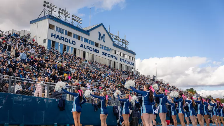 An image of the crowd at Alfond Stadium with cheerleaders present.