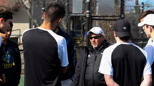 Coach Hale huddle vs. Rockhurst