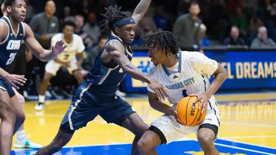 The Kansas City Roos wrapped up their home season on Senior Night in a powerful matchup against the Oral Roberts Golden Eagles, turning the arena into a celebration of resilience, pride, and Roos tradition. With a final score of 94–70 with the Golden Eagles winning, the night was about more than the scoreboard. It was about honoring the senior class for their leadership, commitment, and lasting impact on the program. From emotional pregame recognitions to high-energy plays and a packed crowd filled with family, friends, and fans. As the Roos close the chapter on their home season, their focus now shifts to postseason play as they head into the Summit League Tournament, carrying momentum, unity, and Roos pride into championship season.
