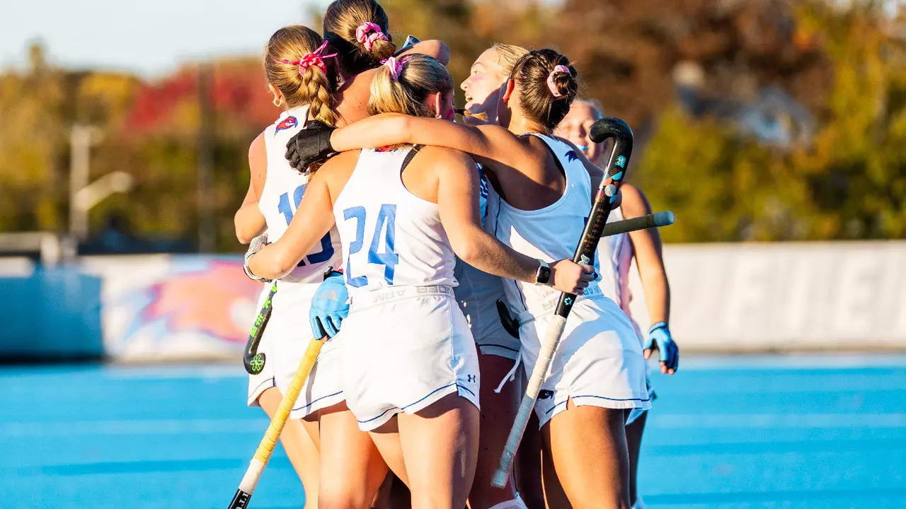 Field hockey team huddle