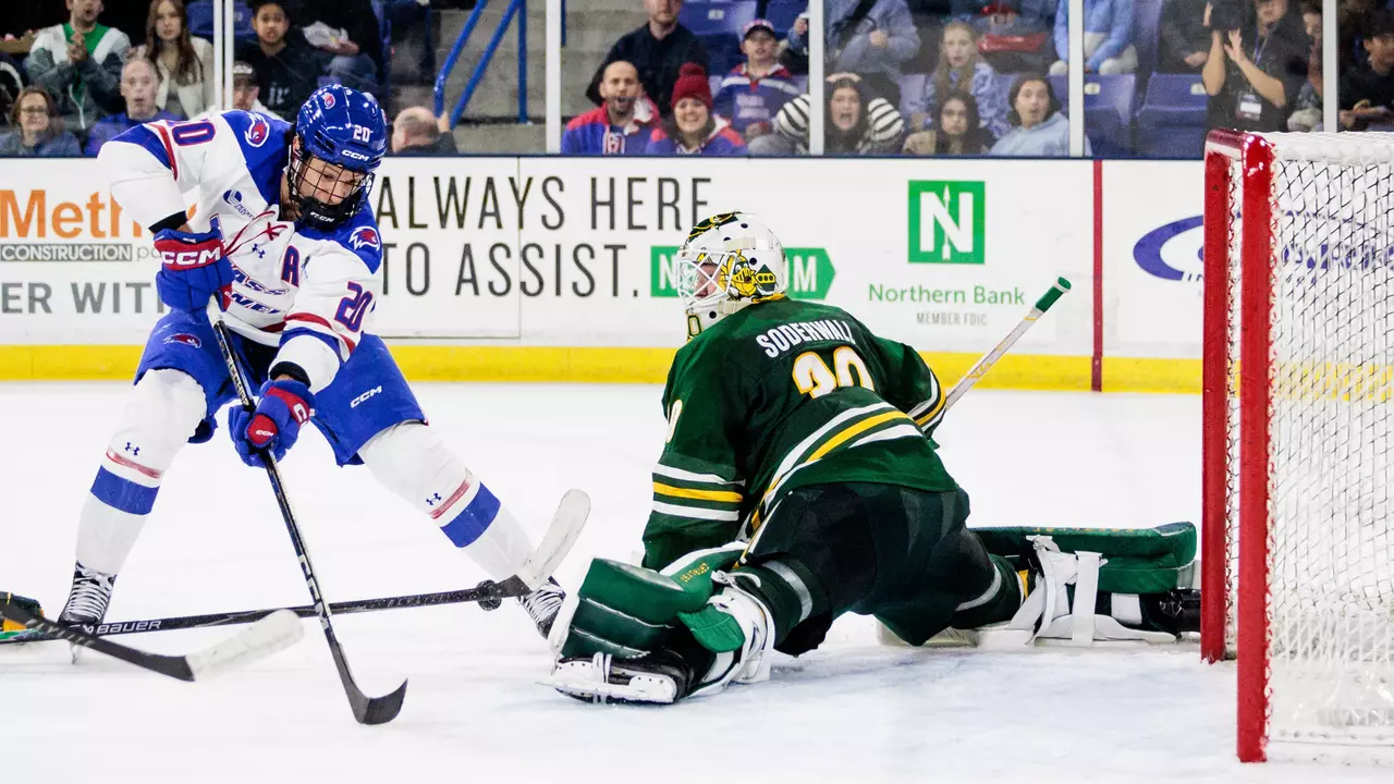 Libor Nemec shooting on net against Clarkson goalie