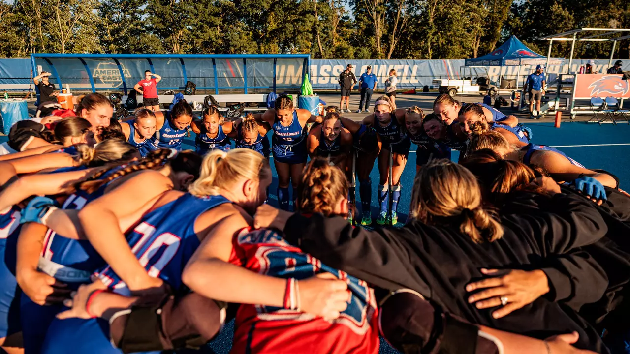 Field Hockey team huddle pregame