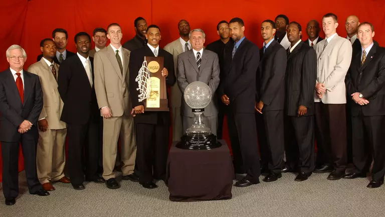 2002 Maryland men's basketball team posed with trophies