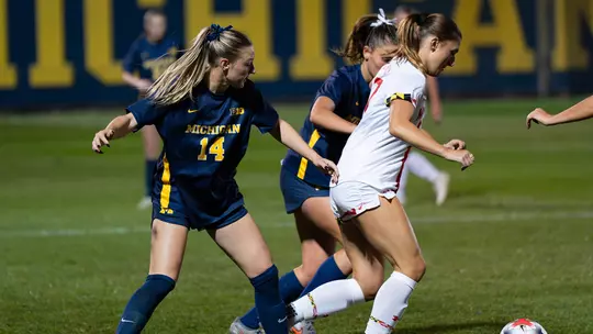 Ellie Egeland Dribbling the ball against Michigan