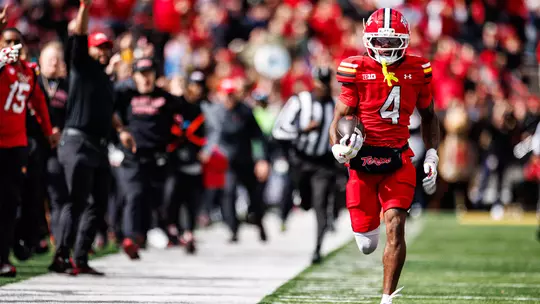 Jamare Glasker runs back a blocked PAT against Rutgers