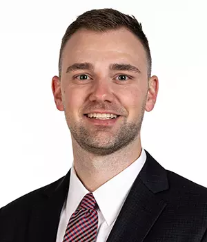 Simmons headshot 26-27