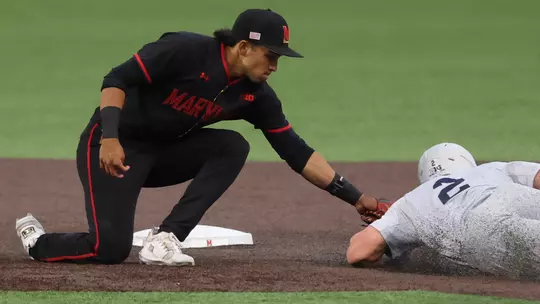 David Mendez tags out a runner against Penn State