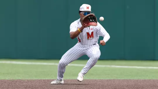 Paul Jones II fields a ground ball in a game against Michigan