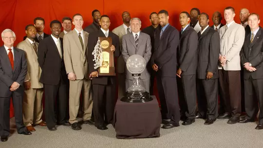 2001-02 Men's Basketball National Championship Team Photo With Trophy