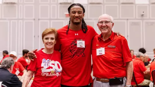 2026 Crab Feast Barry Gossett and Diane with Malik Washington