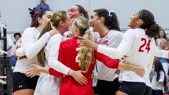 Maryland celebrates a point against ODU