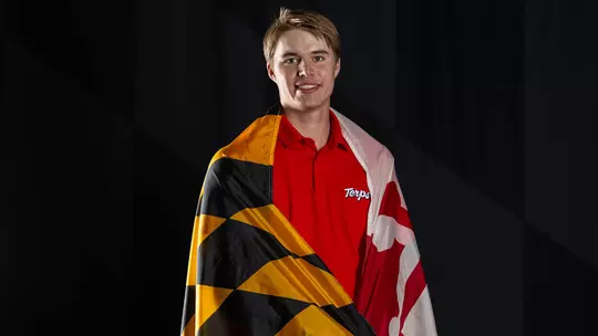 Emil Riegger creative posed with flag