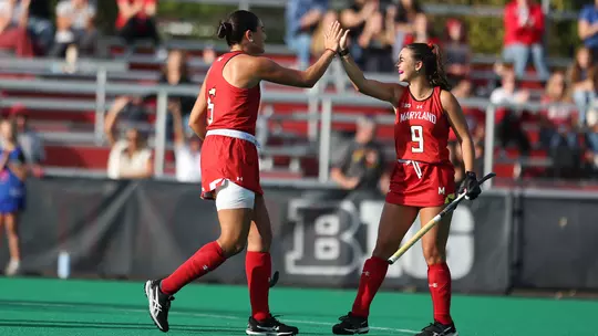 Francisca Eschoyez and Babs van Hest celebrate a goal against Rutgers