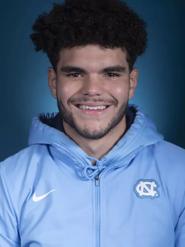Marcus Loving
2023 headshot 
University of North Carolina Wrestling 
Photo Day 
Media & Communications Center 
Chapel Hill, NC 
Tuesday, August 16, 2022