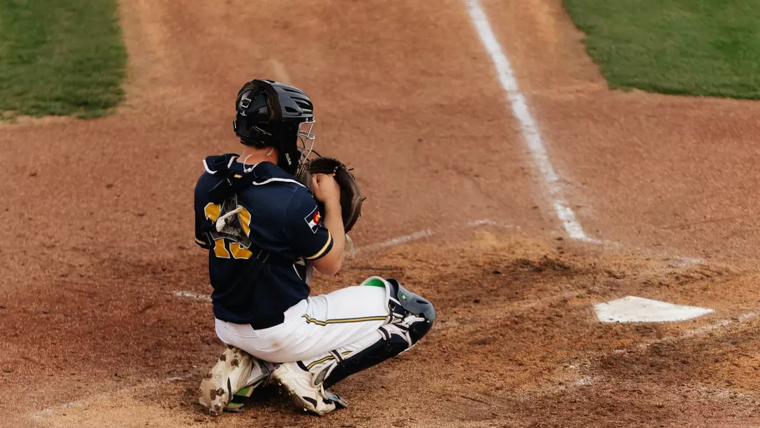 Minic behind the Plate