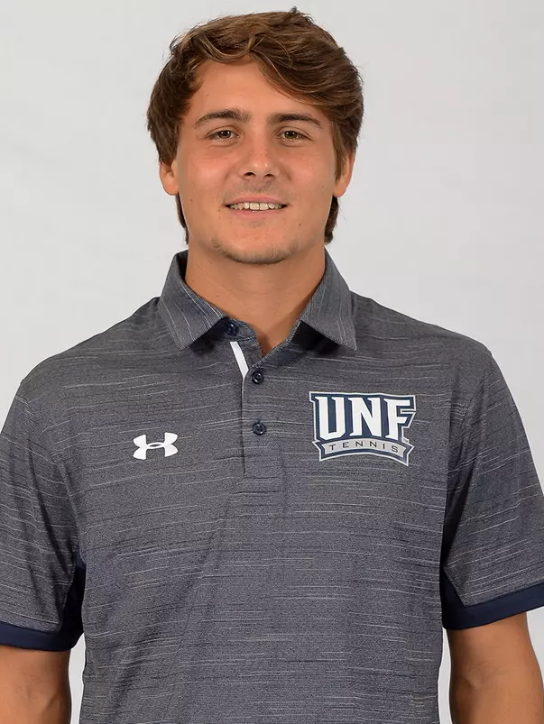 headshot of Dominik Barton