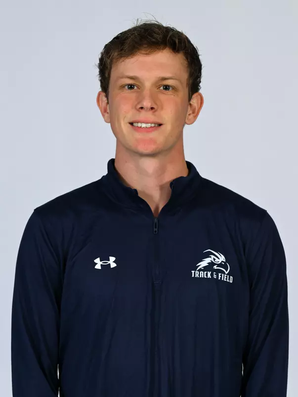 Justin tackling headshot 2023