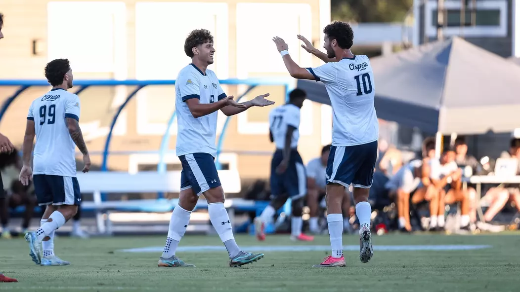 Emir Trto and Anton Khelil celebrate after a goal