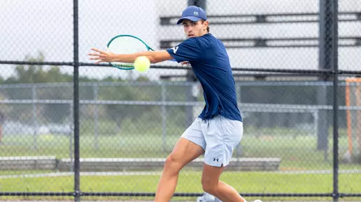 Enrique Pena Prepares To Hit The Ball