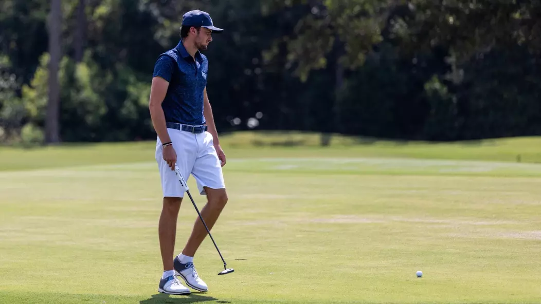 Filippo Serra walking up to approach putt