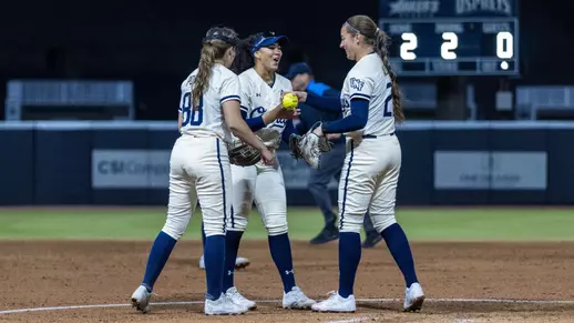 Cam Ponich with fielders in the circle