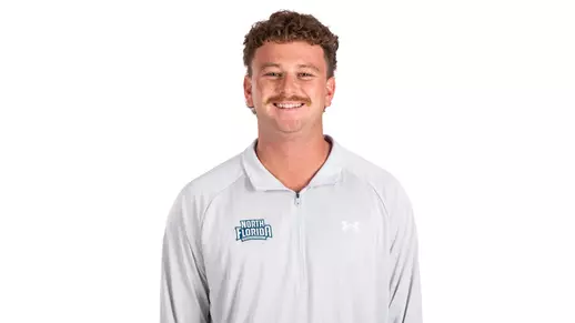 White backdrop photo of Assistant Coach Makai Lipson