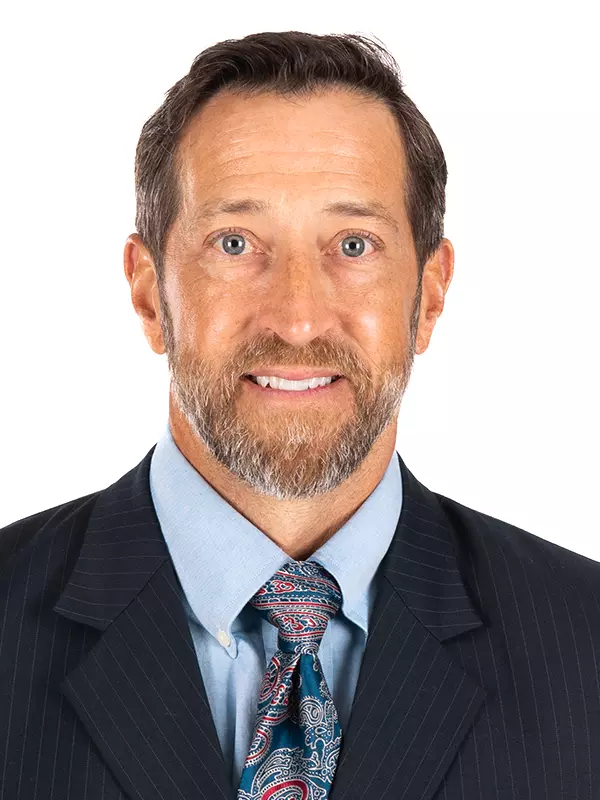 Headshot of Senior Associate Athletic Director/Chief Medical Officer (MBB/MGOLF) Fred Burnett