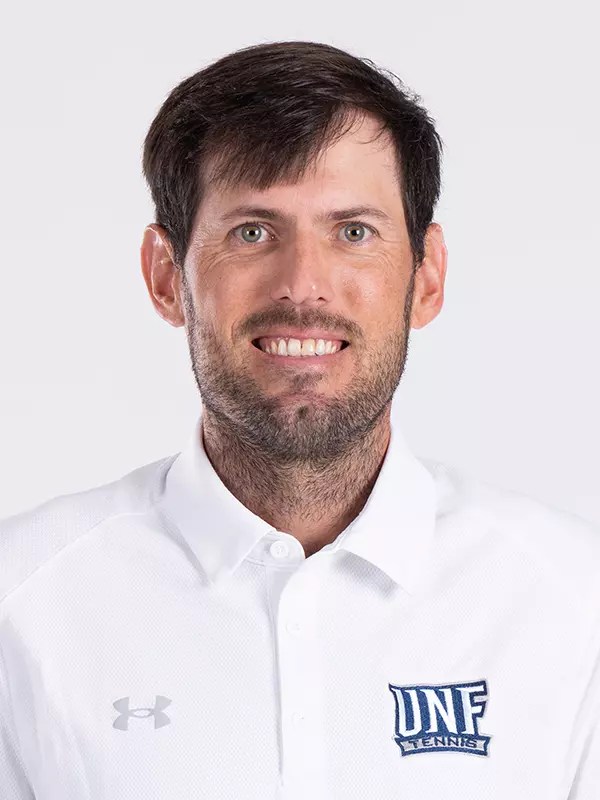 Headshot of Head Coach John Collins
