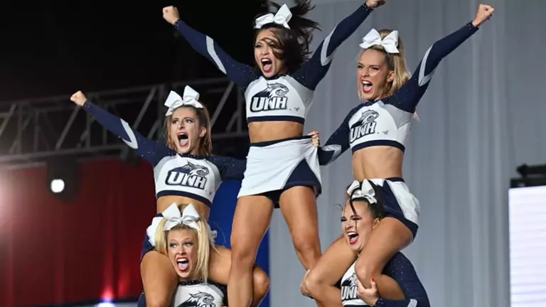 Cheer Team Places Fourth at NCA Championships